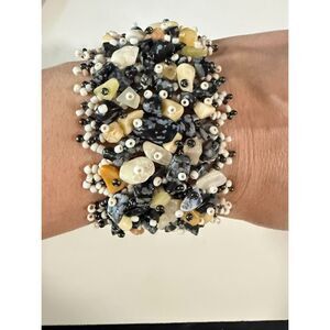 Handmade  beaded cuff bracelet black, white, and tan